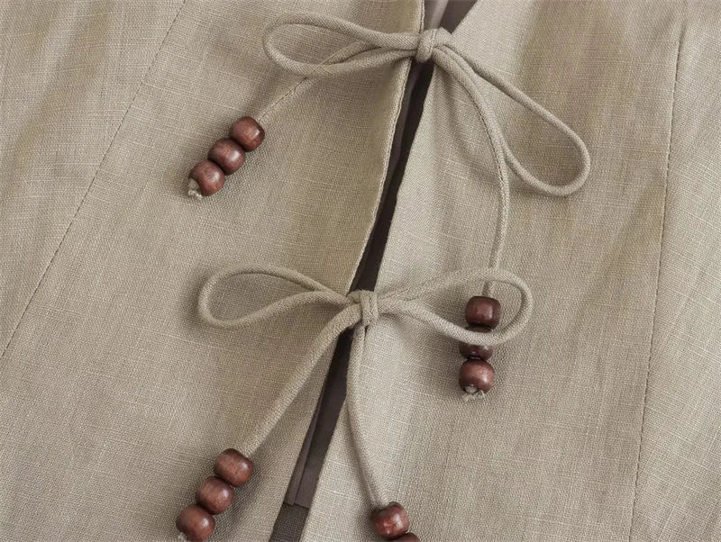 Colete feminino de amarrar com miçangas MegaVest